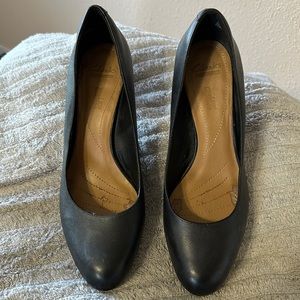 Black heels by Clarke’s